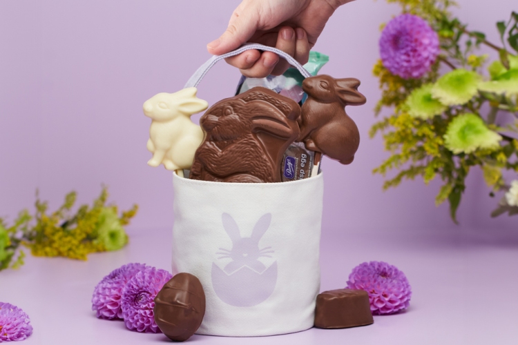 An easter basket filled with chocolate bunnies